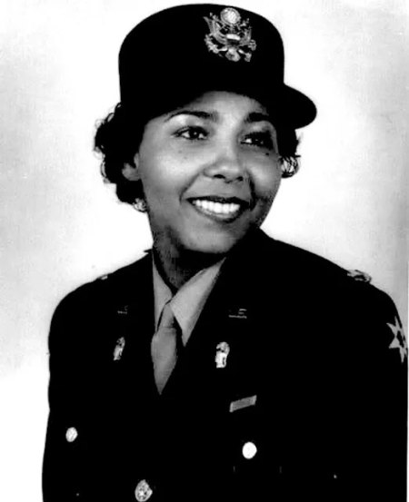 B/W photo of Charity Adams Earley. She was a trailblazer in military history.
She was the first Black woman to become an officer in the Women’s Army Corps and commanded the 6888th Central Postal Directory Battalion during World War II.
Her unit cleared a massive backlog of mail for U.S. soldiers overseas, boosting morale and proving the strength and capability of Black women in the armed forces during a time of segregation and discrimination.  